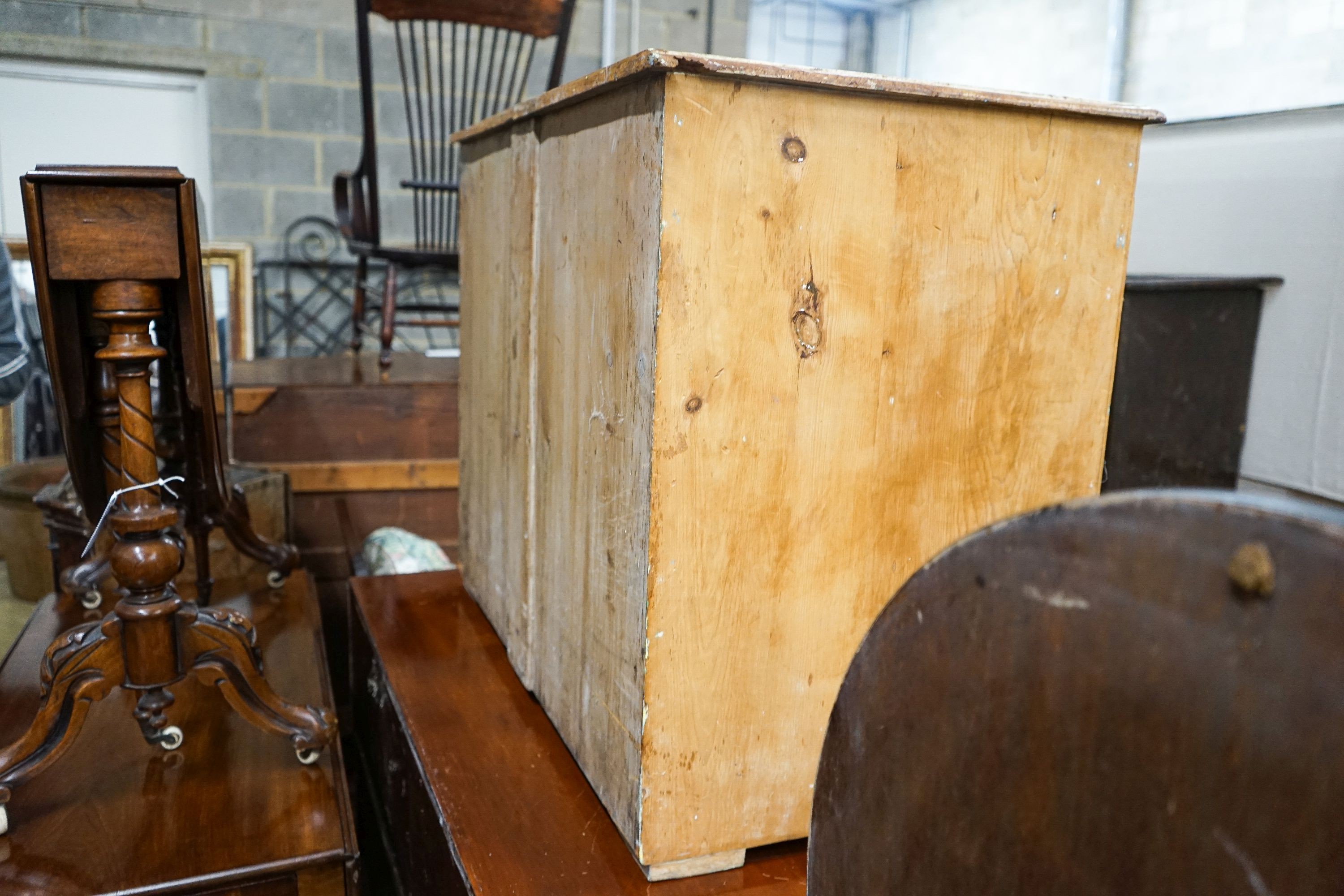 A Victorian stripped pine chest of drawers (lacking feet), width 95cm, depth 53cm, height 74cm